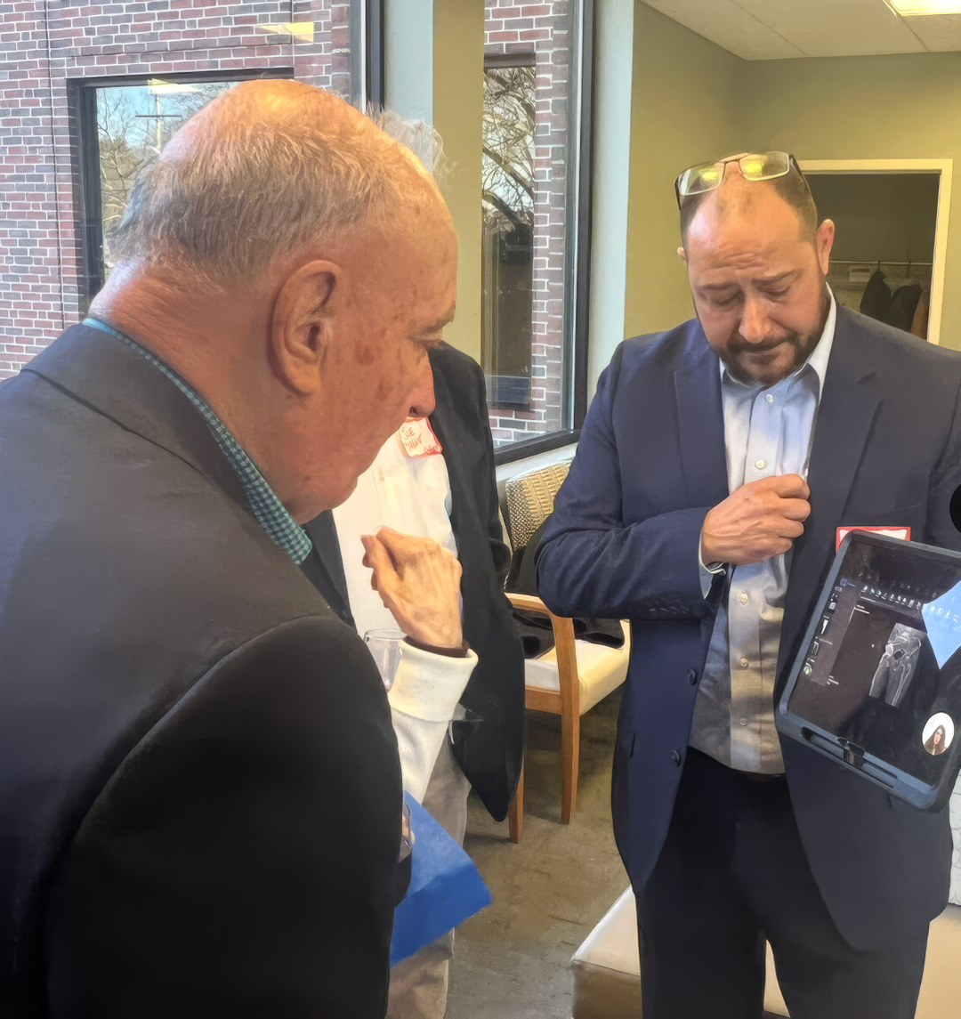 Matt Cohen, Clinical Education Specialist with Nanox, illustrates the clinical value of the Nanox.ARC during a launch event at Access Sports Medicine